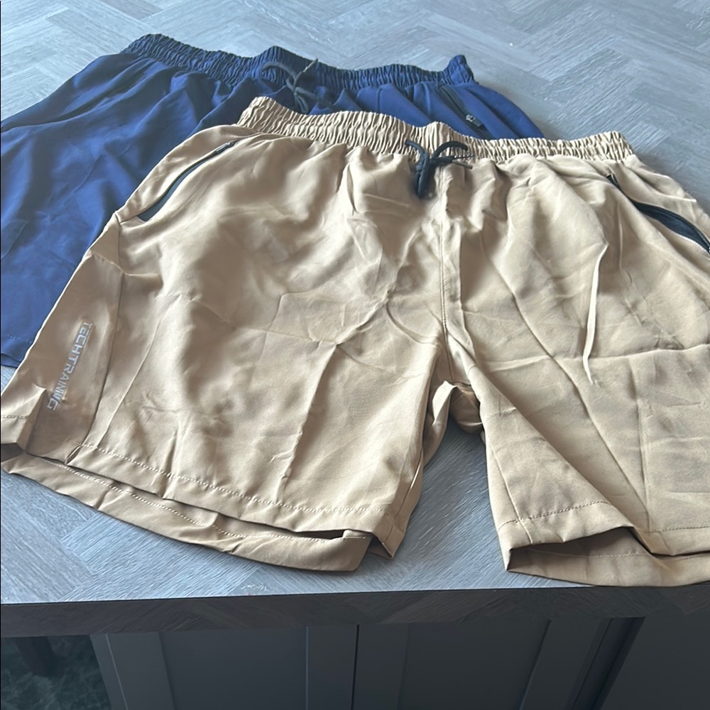 Tan and Blue Athletic Shorts with Elastic Waistband and Lightweight Fabric